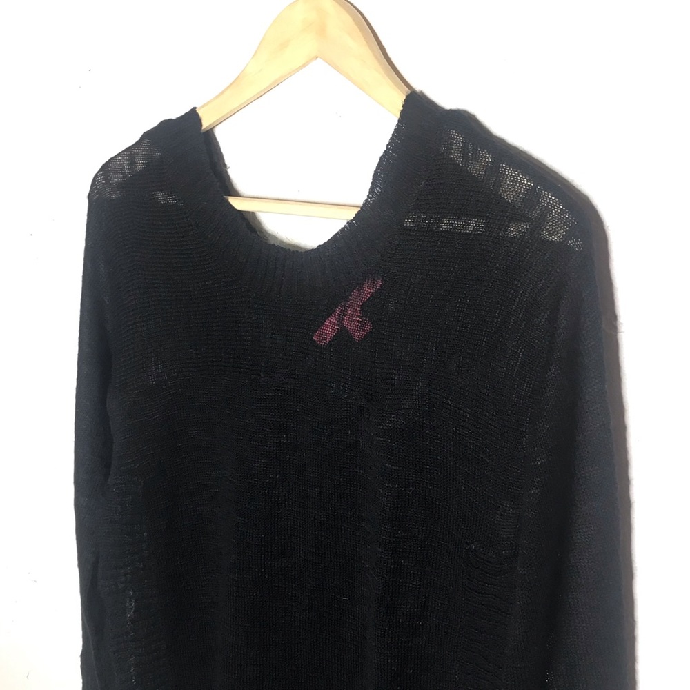 Rebellious One black sweater